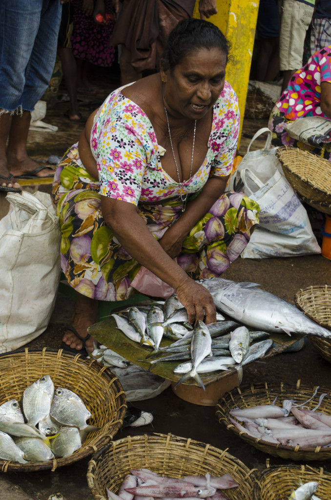 There were only three women selling in the whole market. Their fish were smaller but still she pulled in the punters