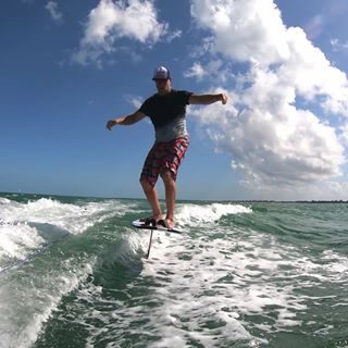 Finally managed it! #wakefoil 
Thanks to a visit from our friend Evan ftom @axisfoils 
The 1m, high aspect wing is a dream to fly on. Wake foiling will be the new go to on no wind days. 
Have you tried it yet? What setup do you use? 
#liveoffaxis #axisfoils  #loyaltothefoil #foiladdict #stillcantgetenough #onthewater #islaholbox #foilsurf #ridethetray
